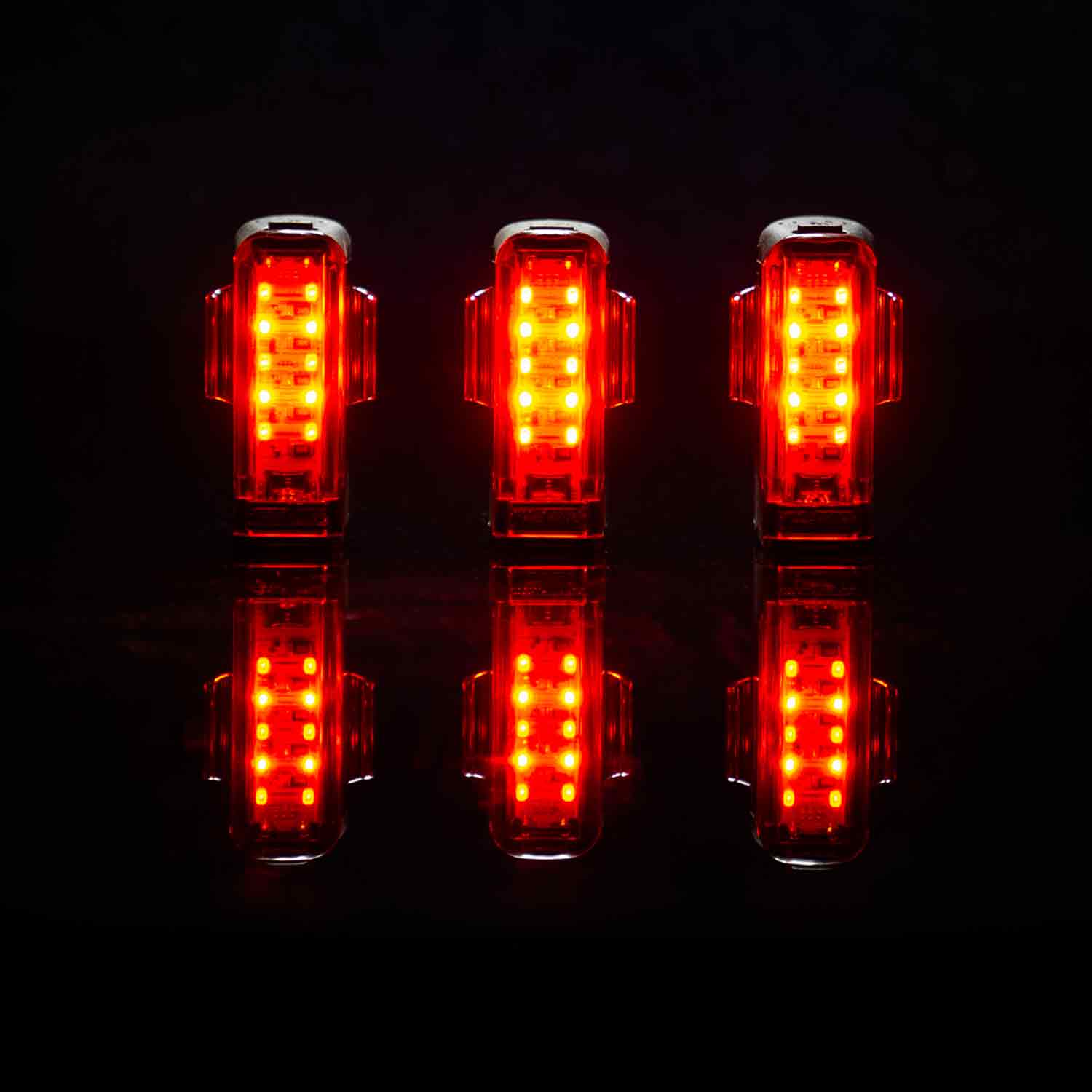 Three sets of strip drive rear pro lights highlighting extended battery capacity