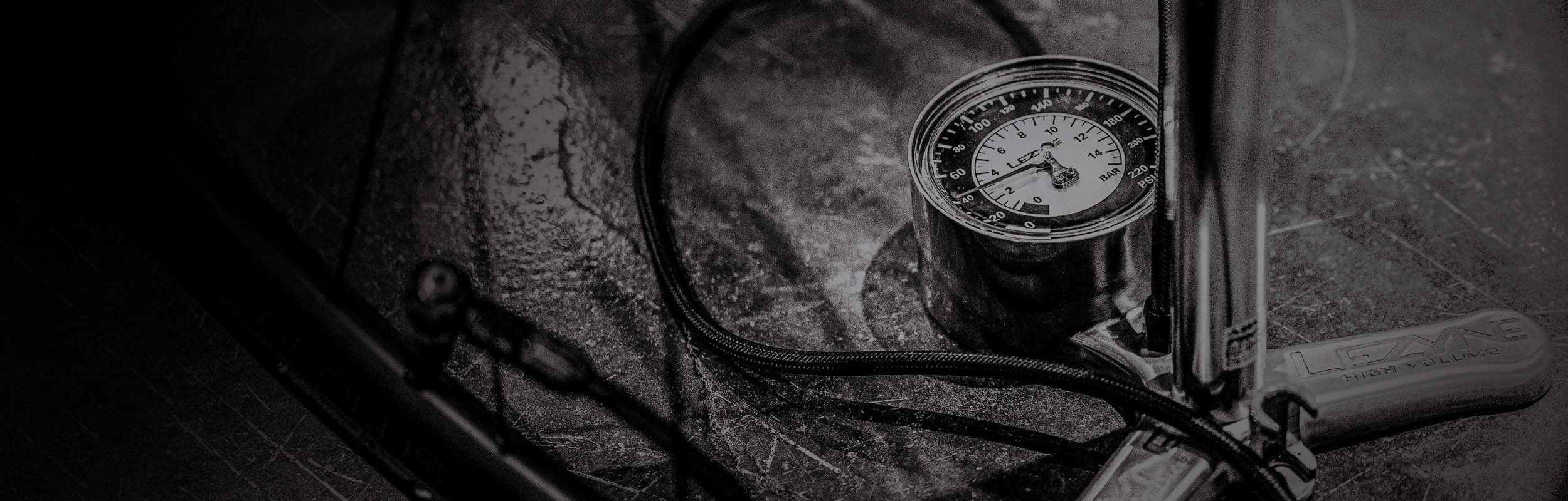 Close-up of Lezyne floor pump for recreation bikes with built-in gauge for precise tire pressure measurement.