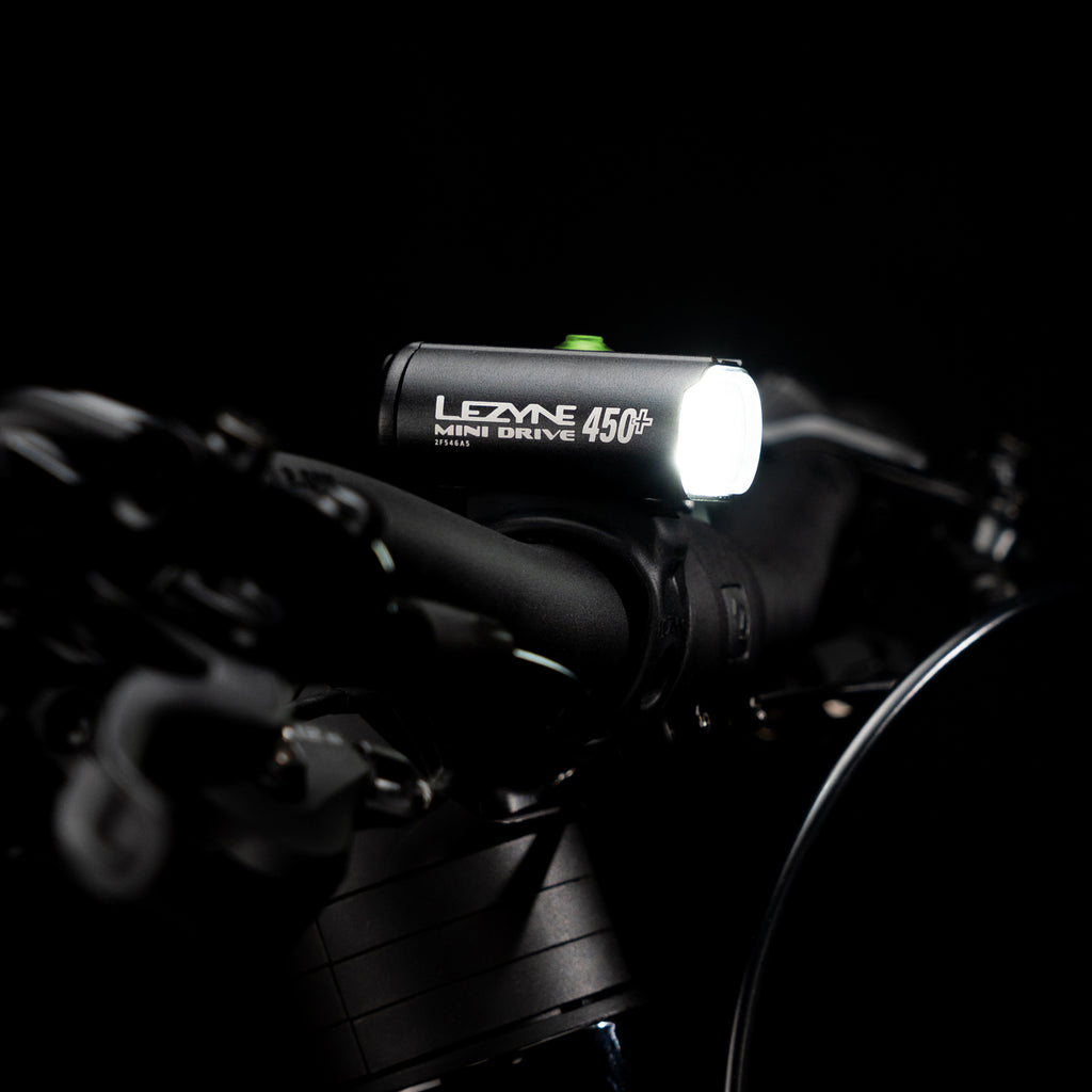 Close side-view studio shot of the Lezyne Mini Drive 450+ Front with CNC-machined aluminum construction