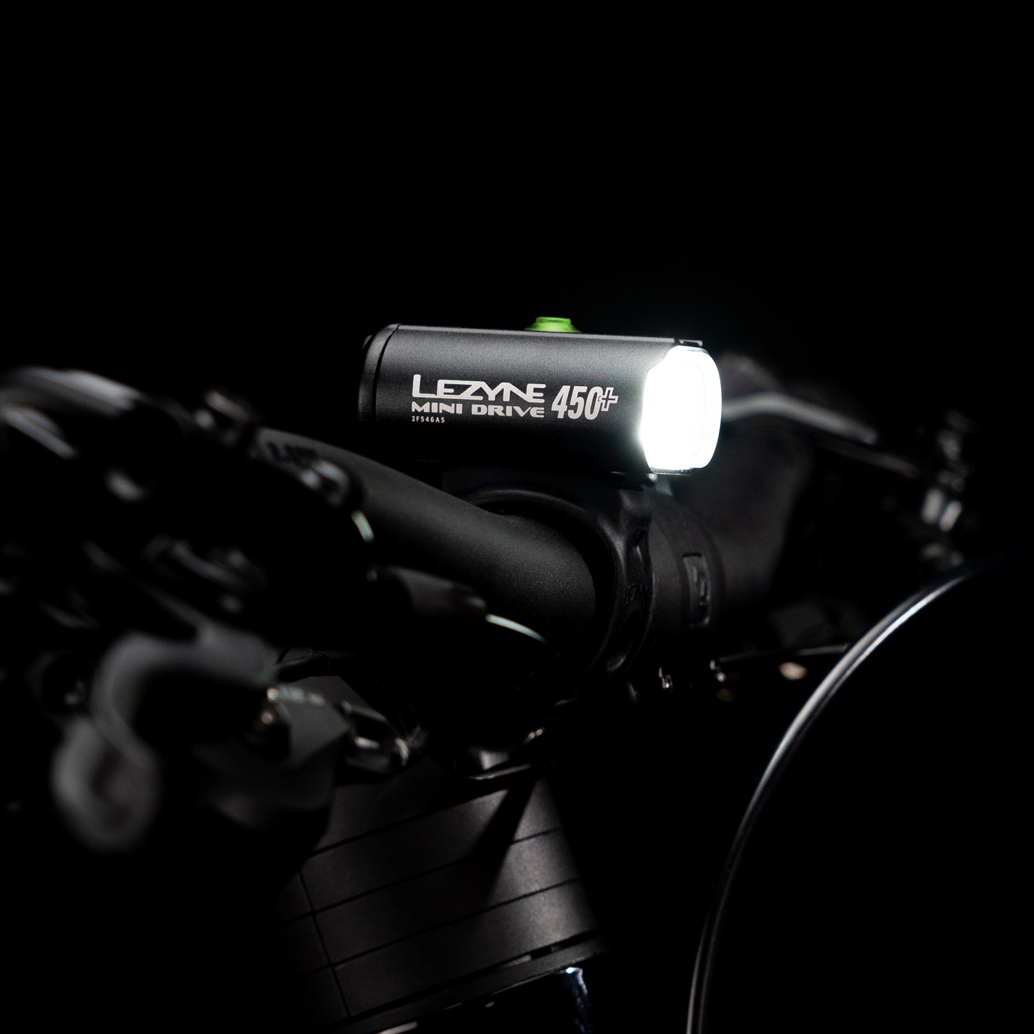 Close side-view studio shot of the Lezyne Mini Drive 450+ Front with CNC-machined aluminum construction
