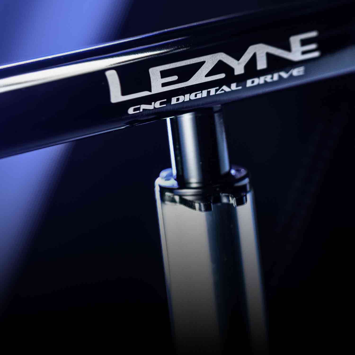 The handle of a floor pump with the words Lezyne CNC Digital Drive printed on it.