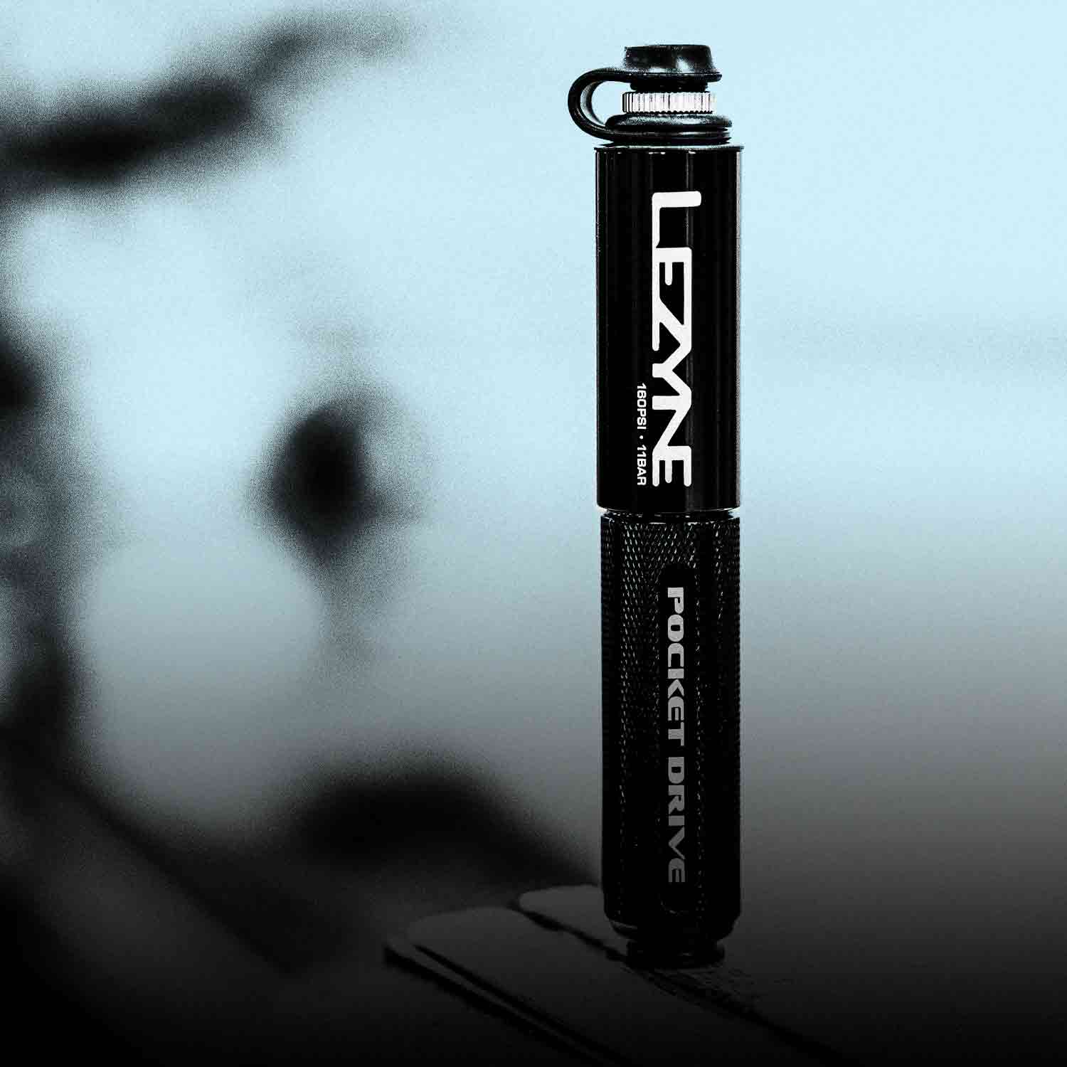 A small bicycle pump with the words Lezyne Pocket Drive printed on it.