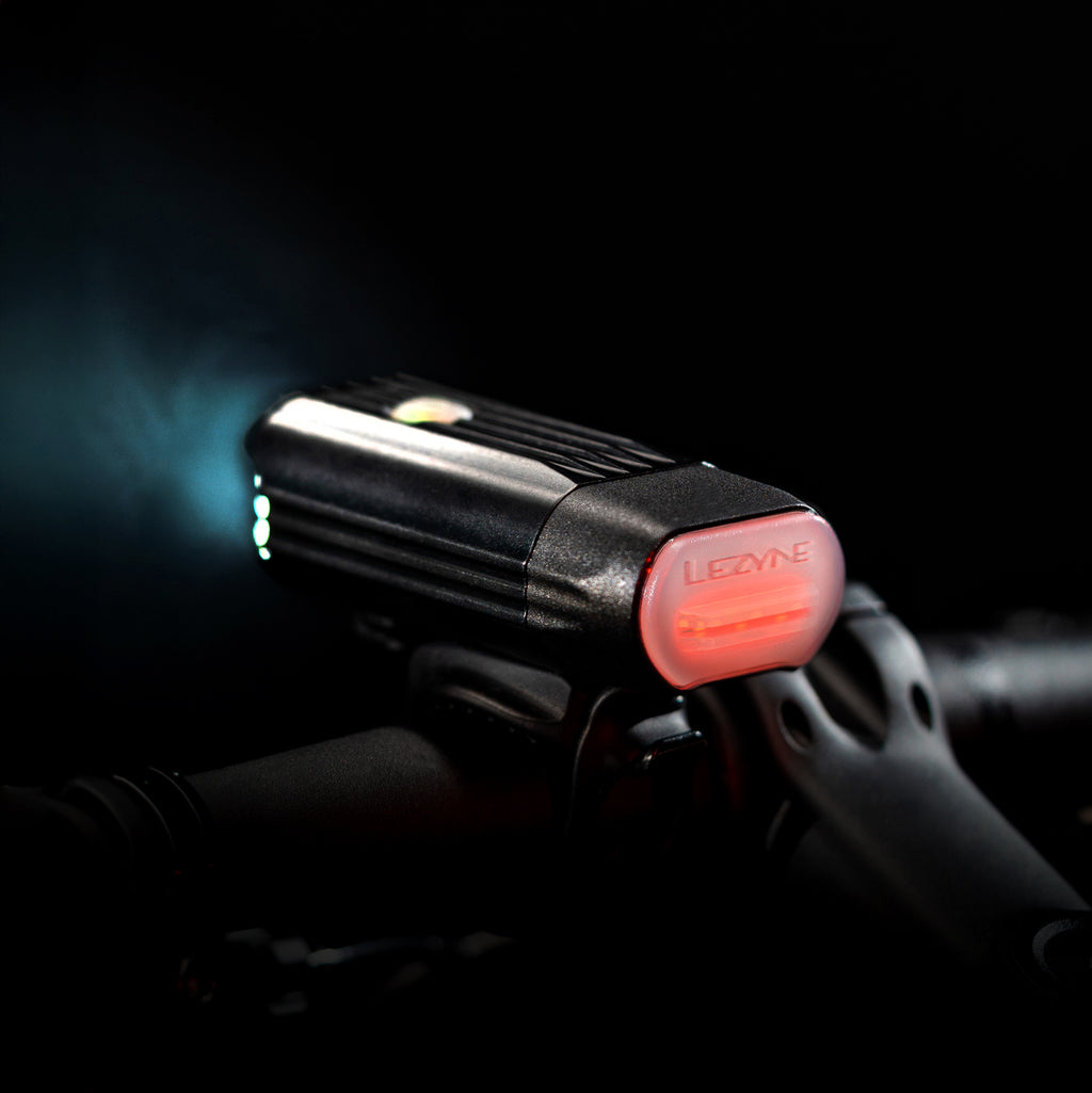 Lezyne React Drive LED front bike light rear studio shot. Alert light illuminating in red.