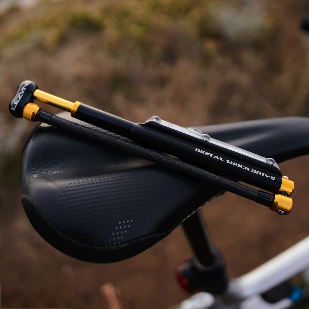 Side view of Digital Shock Drive showing compact design and threaded hose stored in the handle.